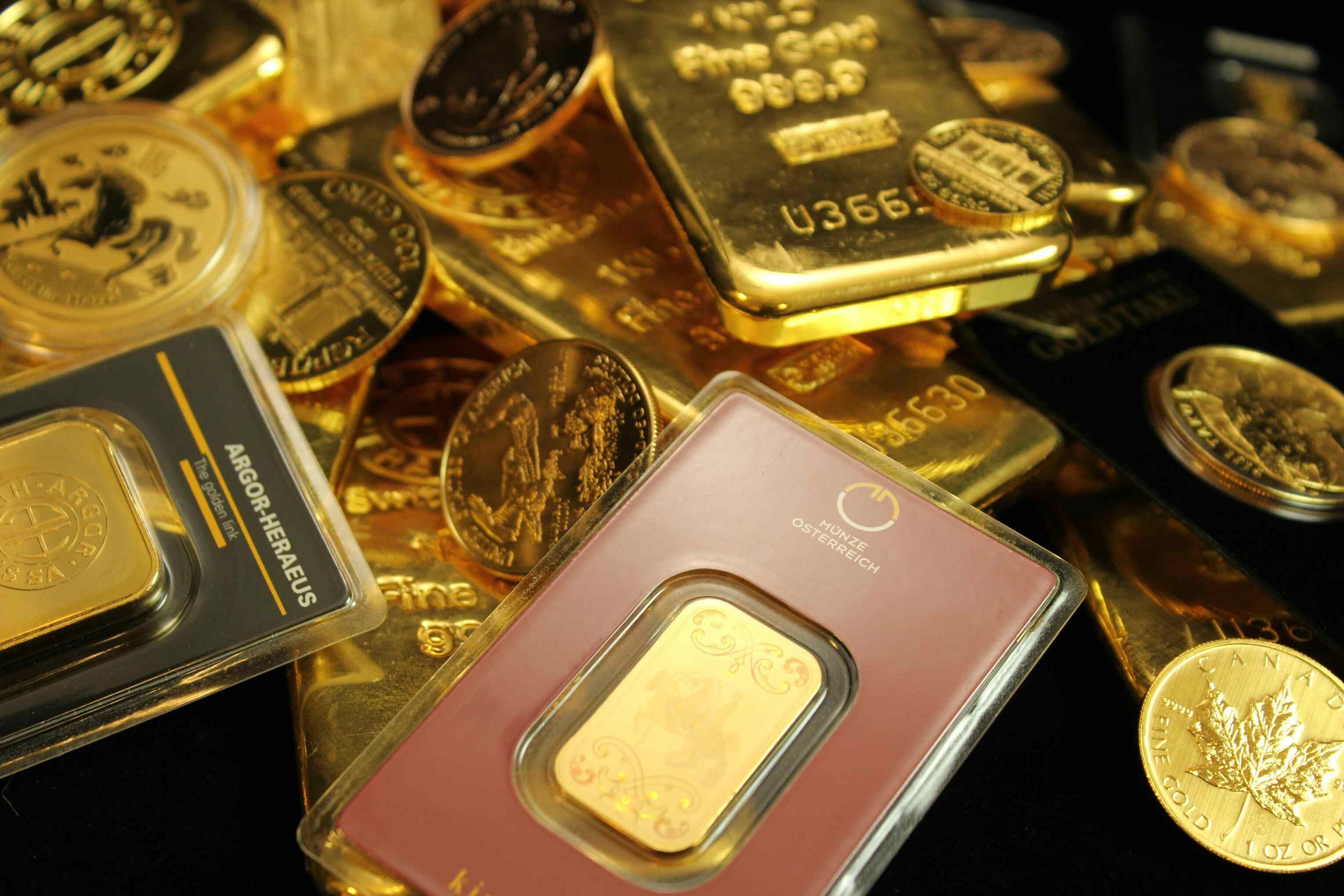 Physical gold in the form of bars and coins Physical gold in the form of bars and coins